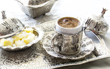 Turkish coffee with delight and traditional silver serving set