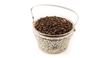 Coffee beans in a bowl on a white background
