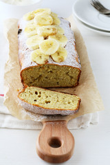 sliced banana cake on board