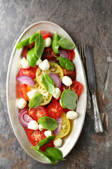 salad caprese on big plate
