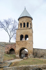Fototapeta na wymiar Bell tower in Samtavro Monastery in Mtskheta - the old capital of Georgia