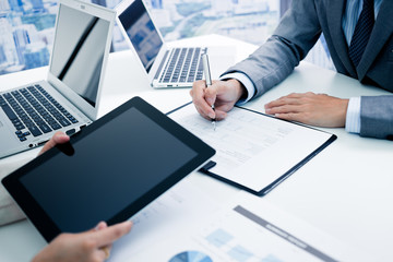 Business people discussing the charts and graphs showing the res