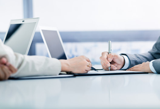 Business man signing a contract