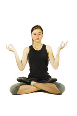 Kobieta siedząca w pozycji jogi
