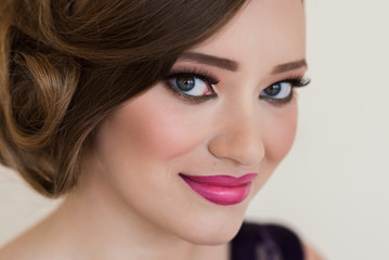 Obraz premium Girl with make-up and a flower smile