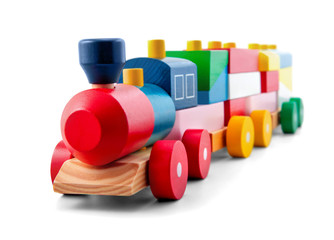 Wooden toy train with colorful blocs isolated over white