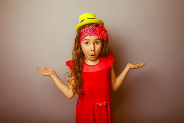 Girl European appearance haired child of seven years in a bright