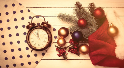 Alarm clock and christmas baubles
