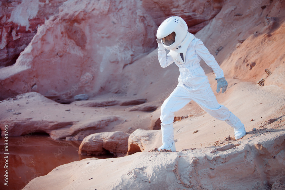 Canvas Prints water on mars, futuristic astronaut, image with the effect of
