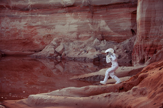 Water on Mars, futuristic astronaut, image with the effect of