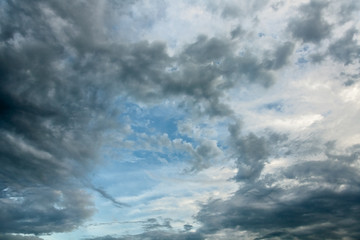 Naklejka na ściany i meble Blue sky with storm clouds