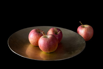 Alone. Lonely red apple set apart from the others.