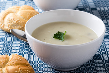 champignon soup in white bowl