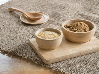wheat germ and  Brown sugar  in wooden bowl