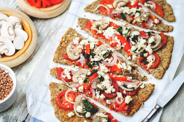 buckwheat Chia seed pizza crust with mushrooms, tomato, Basil an