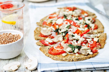buckwheat Chia seed pizza crust with mushrooms, tomato, Basil an