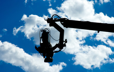 Television camera on dolly silhouette