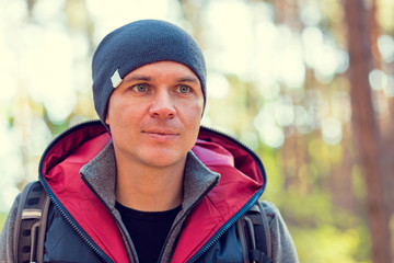 man hiking in a forest