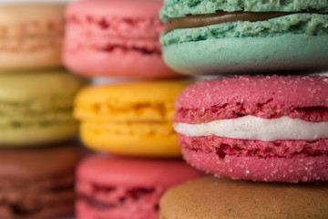 colored macarons. stacked macaroons.