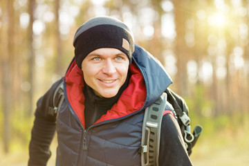 man hiking in a forest