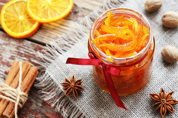 Obraz na płótnie Canvas Homemade candied peels orange jam in glass jar