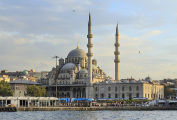 Naklejka premium New Mosque (Yeni Cami) with sea water ,Istanbul,Turkey.