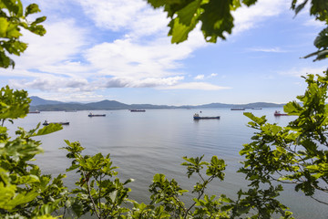 Fototapeta na wymiar Vessels at anchor. Panorama of the port. Vessels at anchor. Calm 