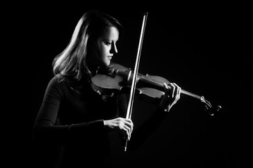 Fototapeta premium Violin player violinist playing classical music