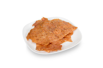 sliced sheets of dried crispy pork, isolated on white background