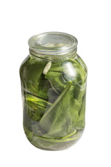 Pickles in a jar on a white background