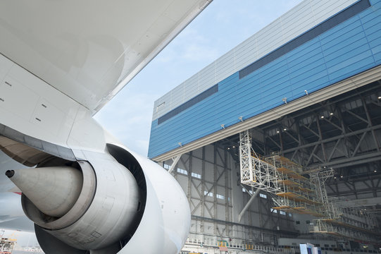 Jet Engine And Aircraft Hangar