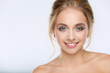 Fototapeta premium Portrait of beautiful woman on white background