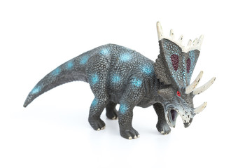 styracosaurus toy on a white background
