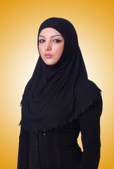 Muslim young woman wearing hijab on white