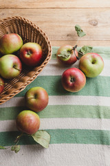 Fresh organic apples, on wooden table
