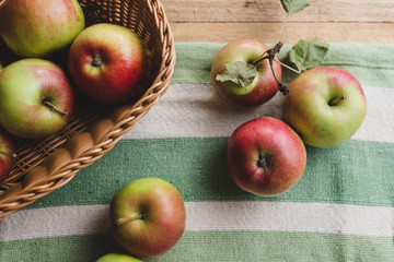 Fresh organic apples, on wooden table

