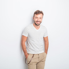 Obraz premium happy young casual man with big smile