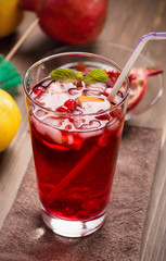 Pomegranate with lemon and ice