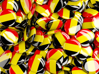 Background with round pins with flag of belgium