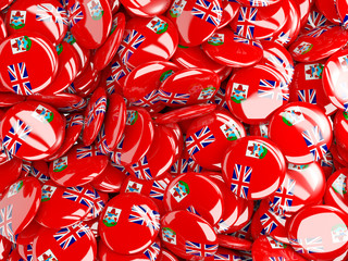 Background with round pins with flag of bermuda