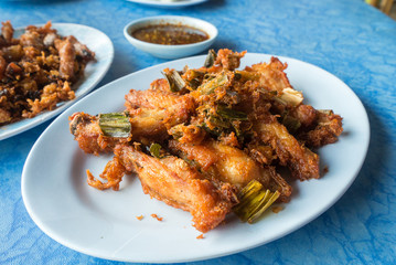 Deep fried Chicken Wings with many herbs