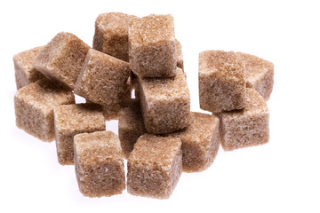  brown cane sugar cubes isolated on white background