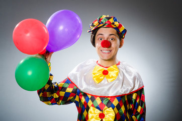 Funny clown in comical concept