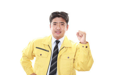 ガッツポーズの作業員