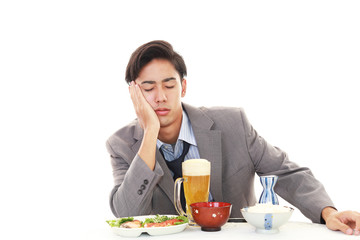 二日酔いの男性