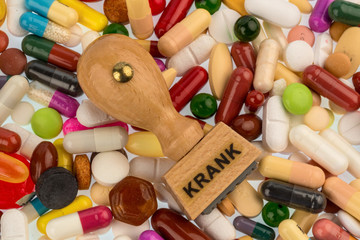 Stempel auf bunten Tabletten