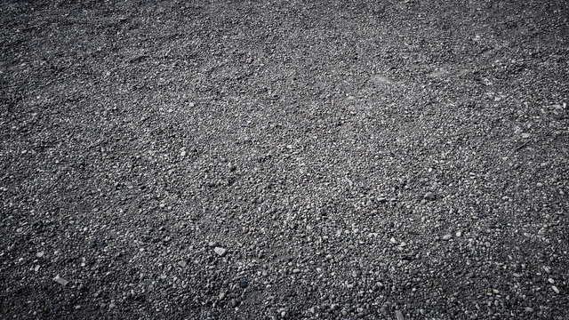 Close up of small gravel stones texture background
