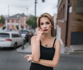 Portrait of beautiful blonde. Vintage color tone.