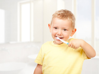 child brushing teeth