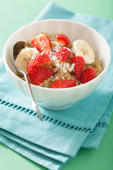 healthy breakfast quinoa with strawberry banana coconut flakes
